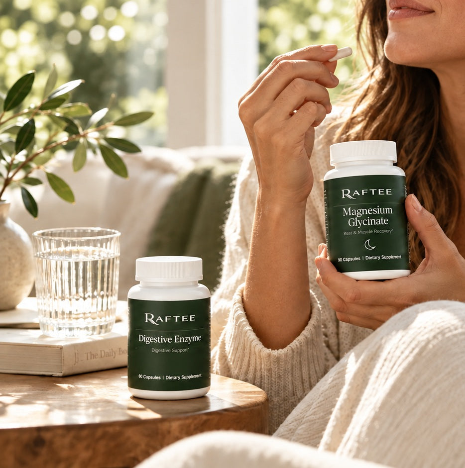 Woman in a sunlit everyday wellness moment holding Raftee Magnesium Glycinate, with Raftee Digestive Enzyme on the table